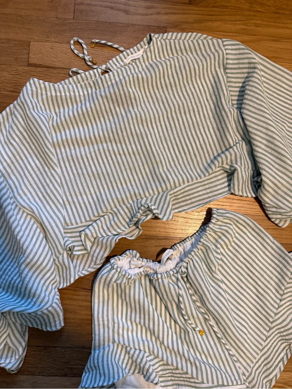 Altar'd State Sage Green Striped Ruffle Hem Drawstring Shorts - Picture 3 of 5